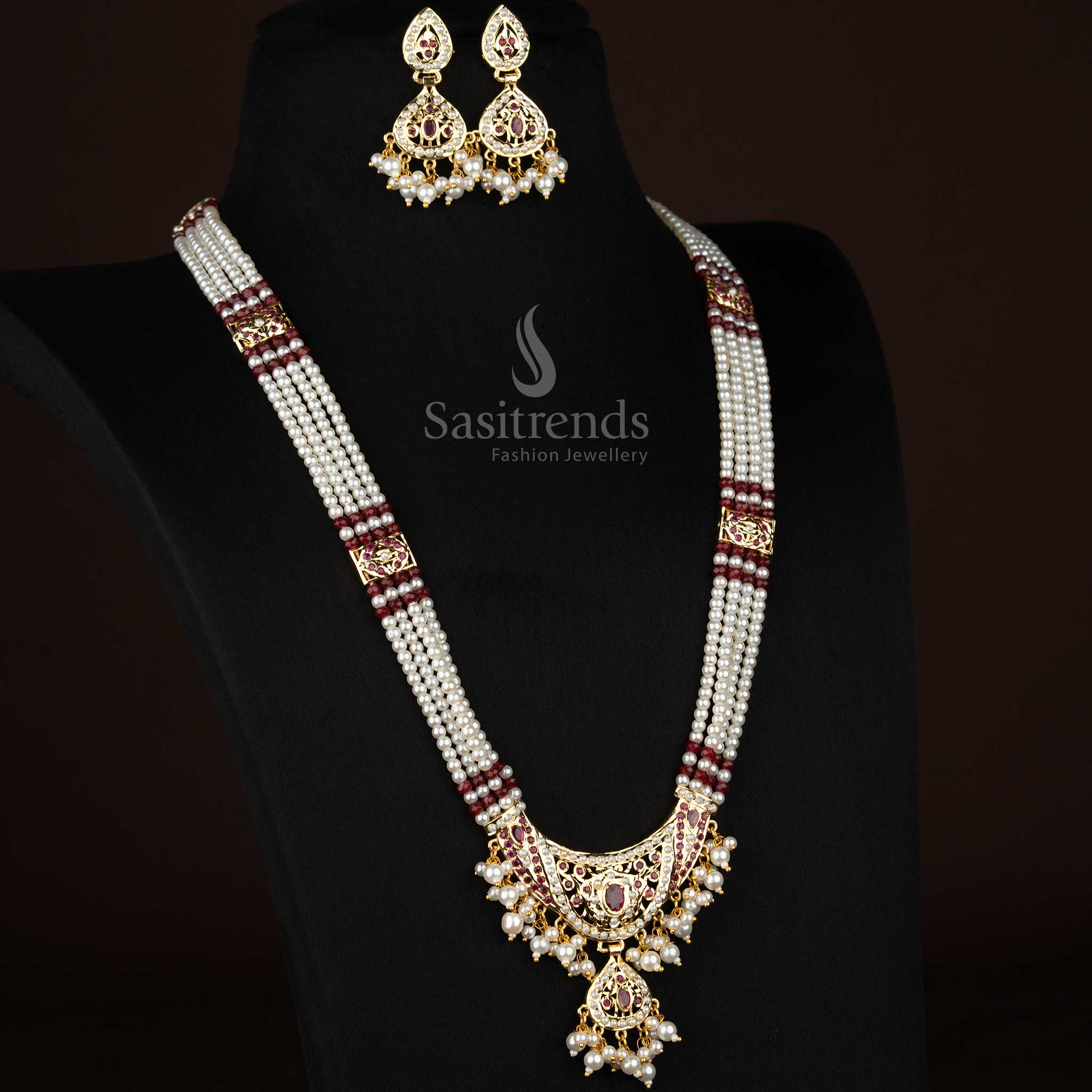premium four layer pearl haram jewellery featuring American Diamond stone centre design, pearl drop detailing and premium micro gold plated finish for engagement and party wear from Sasitrends