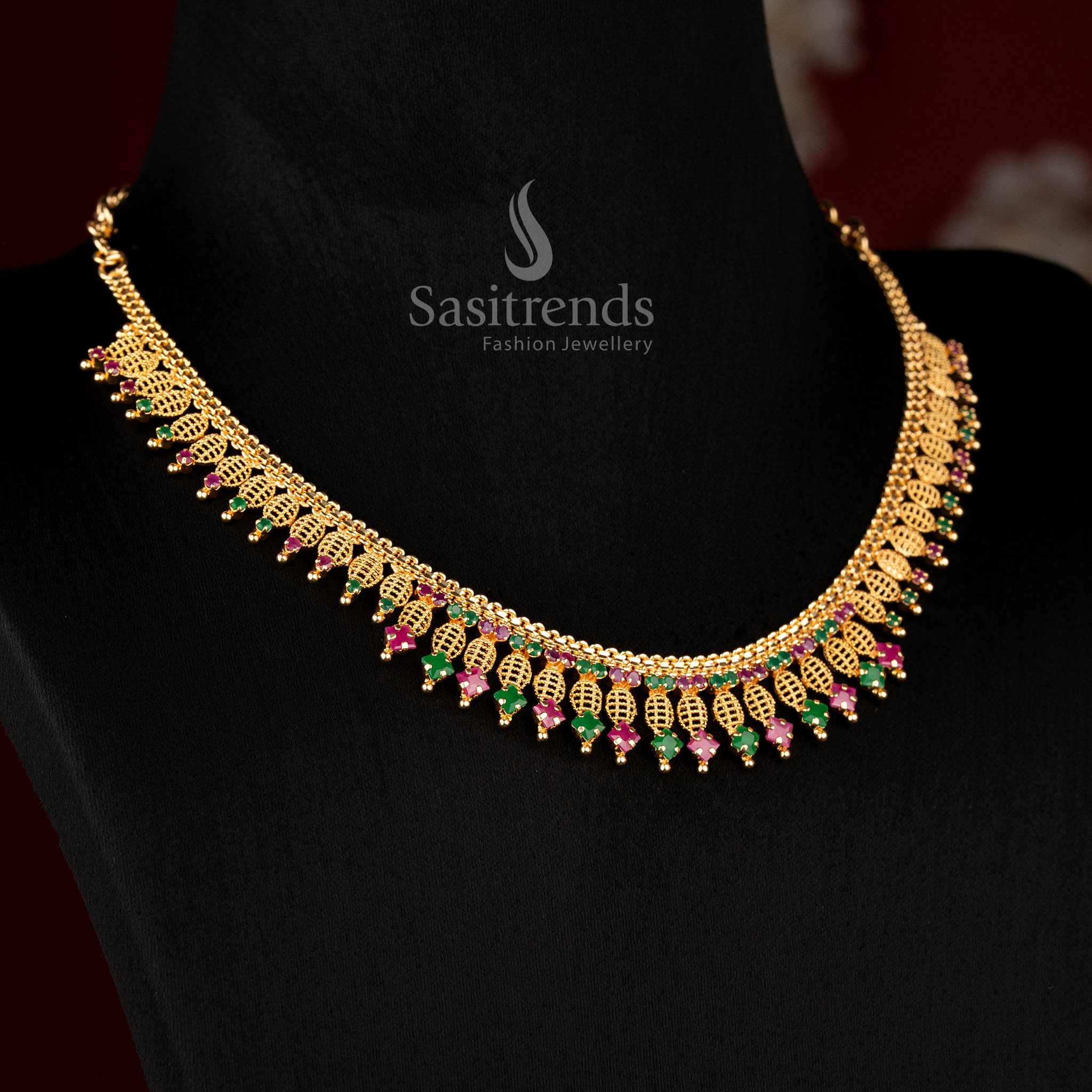 Sasitrends traditional micro gold plated leaf lattice necklace featuring intricate structure with AD stones and rich drop fringe detailing for festive and cultural wear