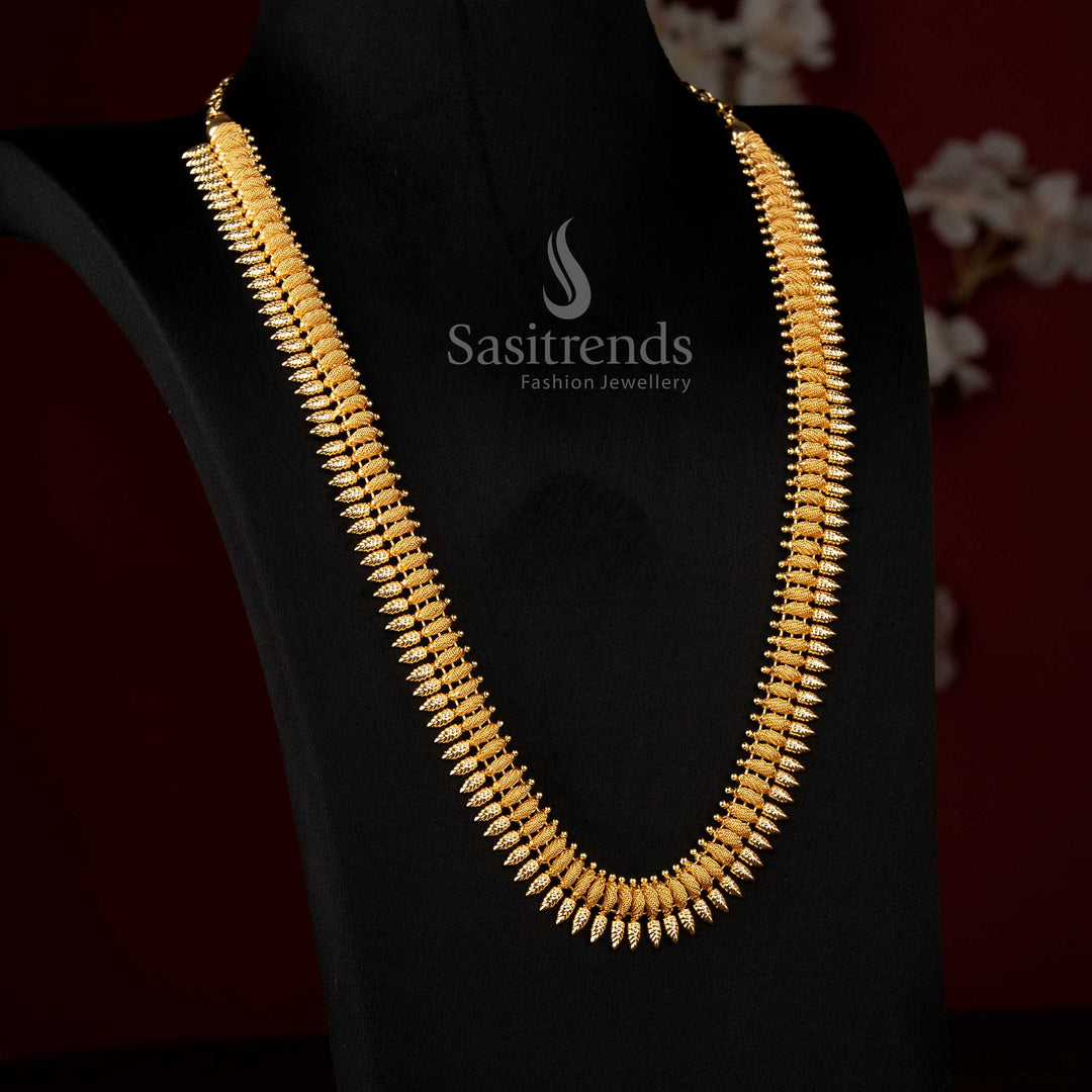 Micro gold plated long necklace featuring dense spine link structure with repeated leaf pattern and finely textured traditional design by Sasitrends