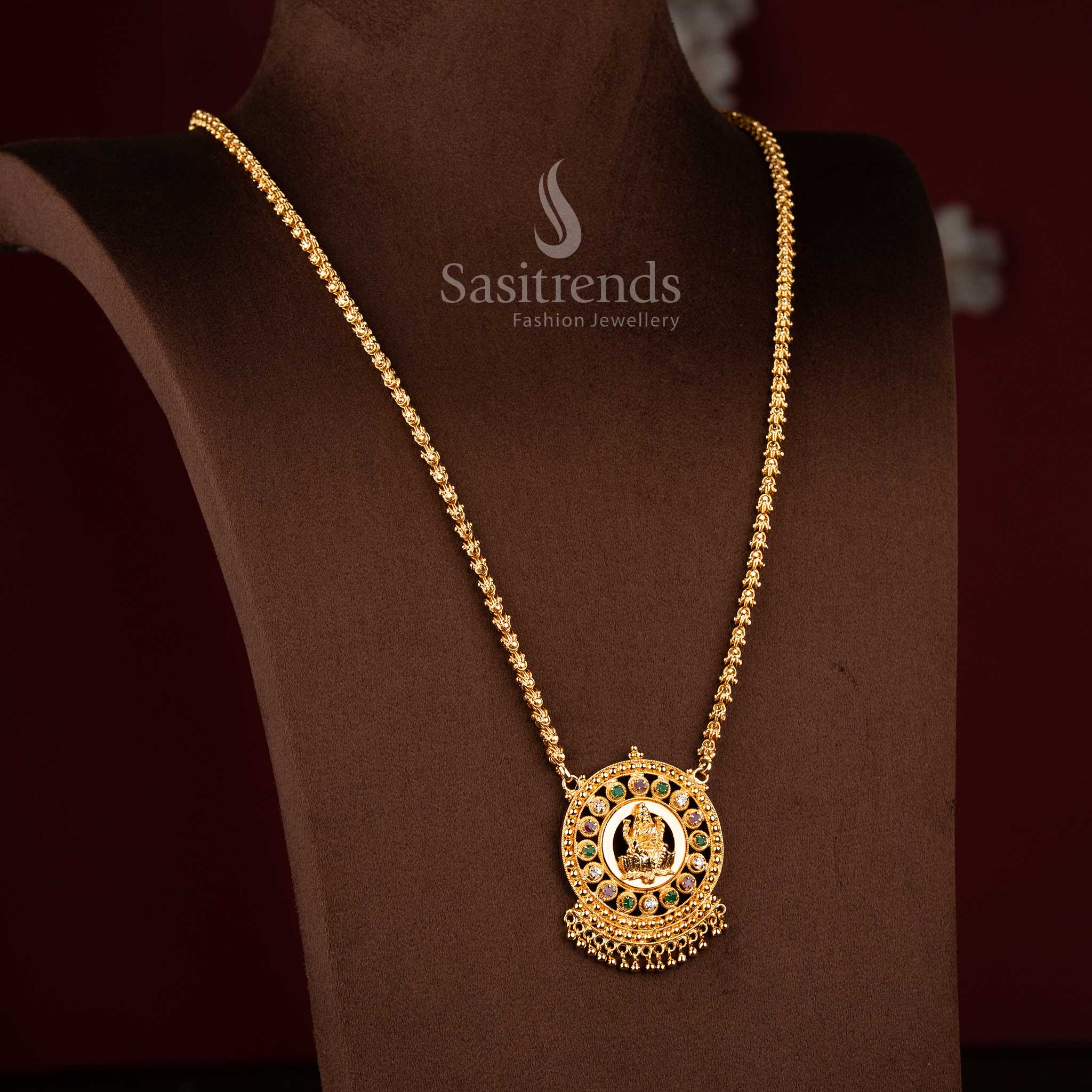 Sasitrends traditional one gram micro gold plated Lakshmi motif pendant chain necklace designed with AD stone encircled frame crafted in temple inspired jewellery style