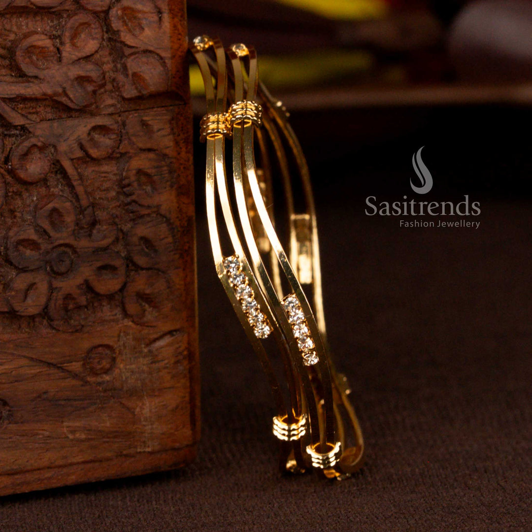 Sasitrends micro gold plated bangles with para stone line detailing and sleek layered structure