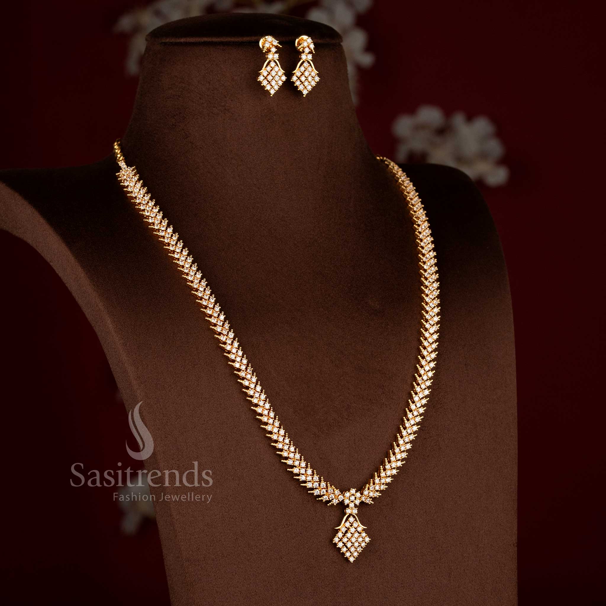 Sasitrends traditional micro gold plated white AD stone long  necklace and earrings set with layered geometric stone arrangement