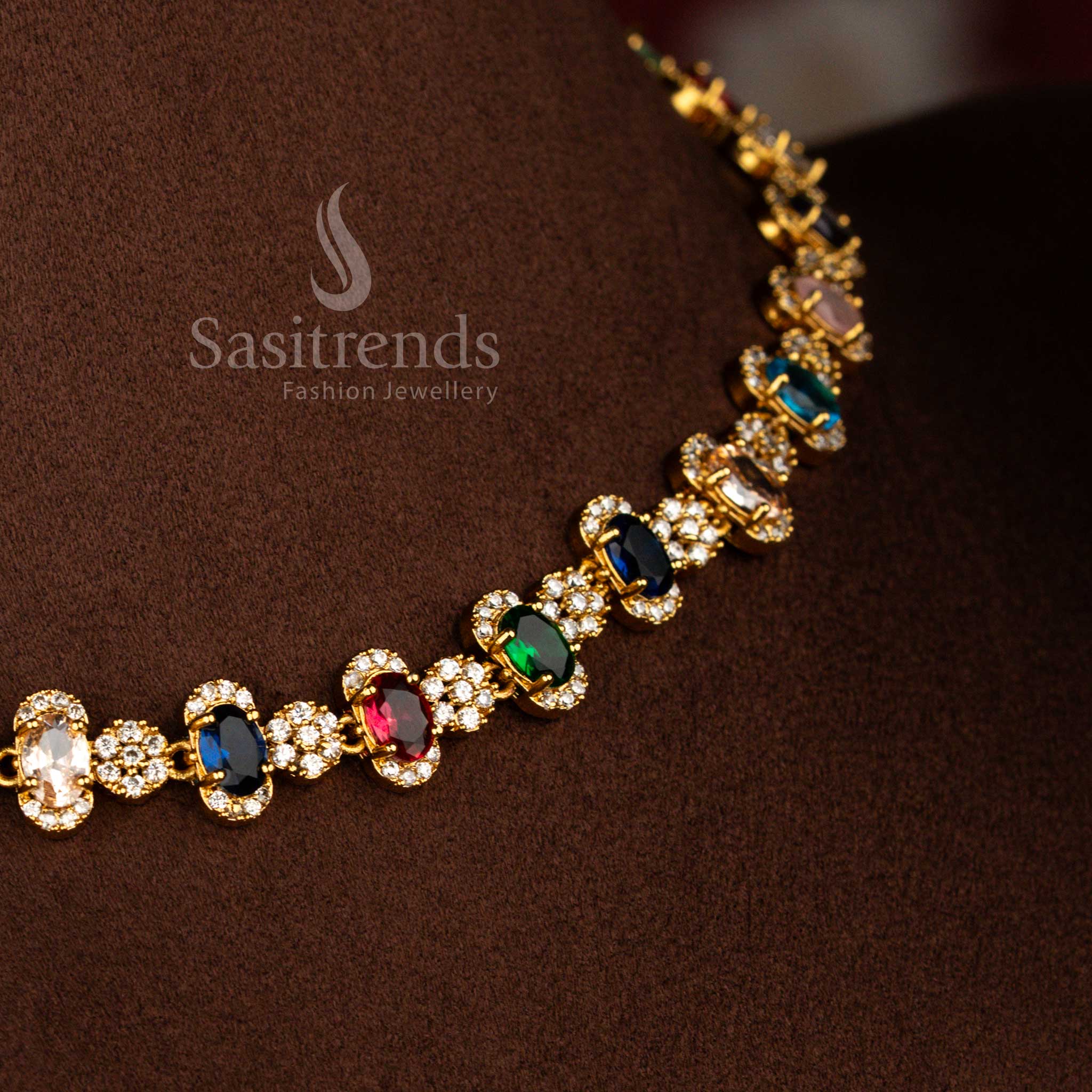 Sasitrends traditional oval frame structured Navarathna American Diamond matte gold plated necklace set designed for bridal and reception wear