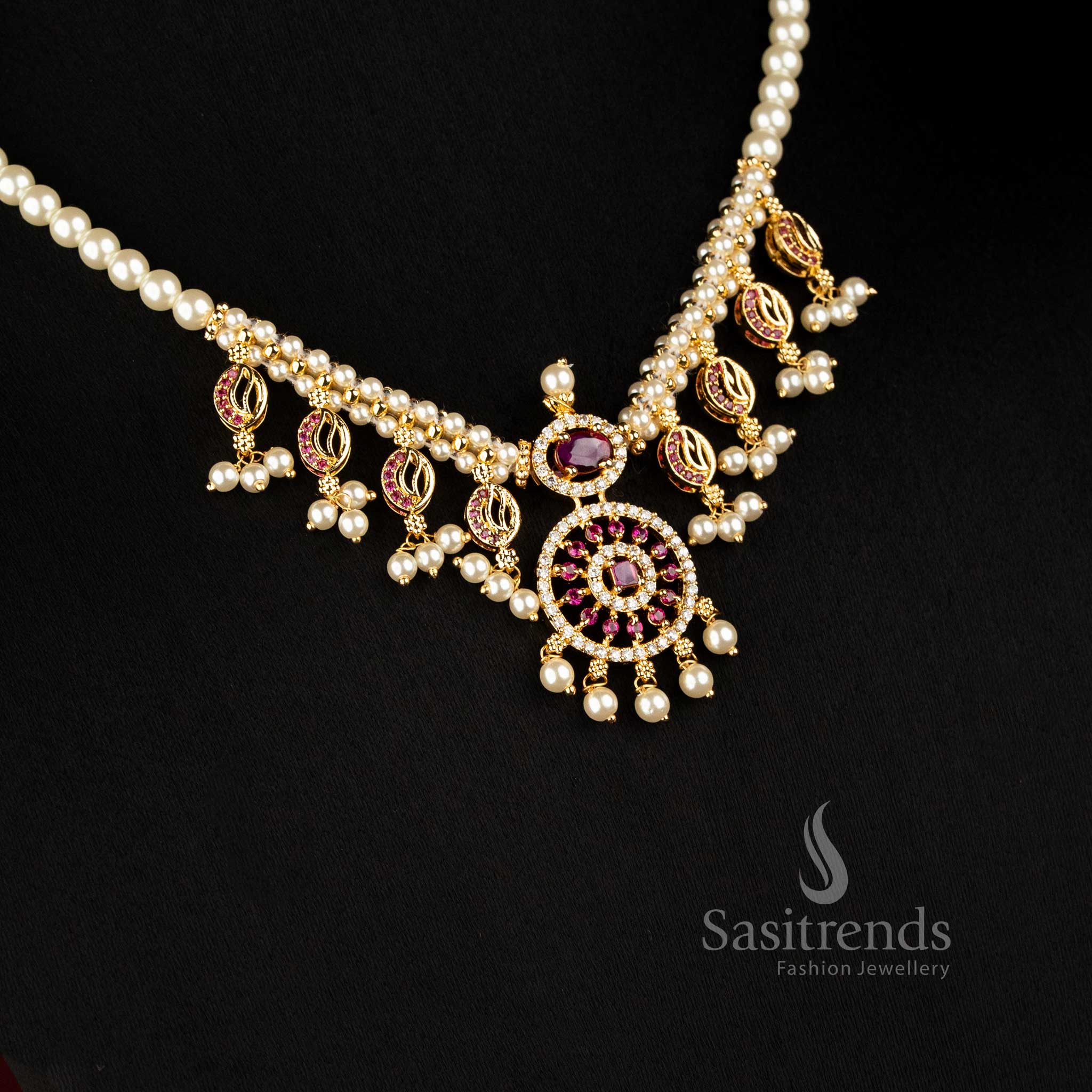 Sasitrends traditional pearl necklace featuring ornate central floral pendant, layered motifs and matching earrings 3039A 