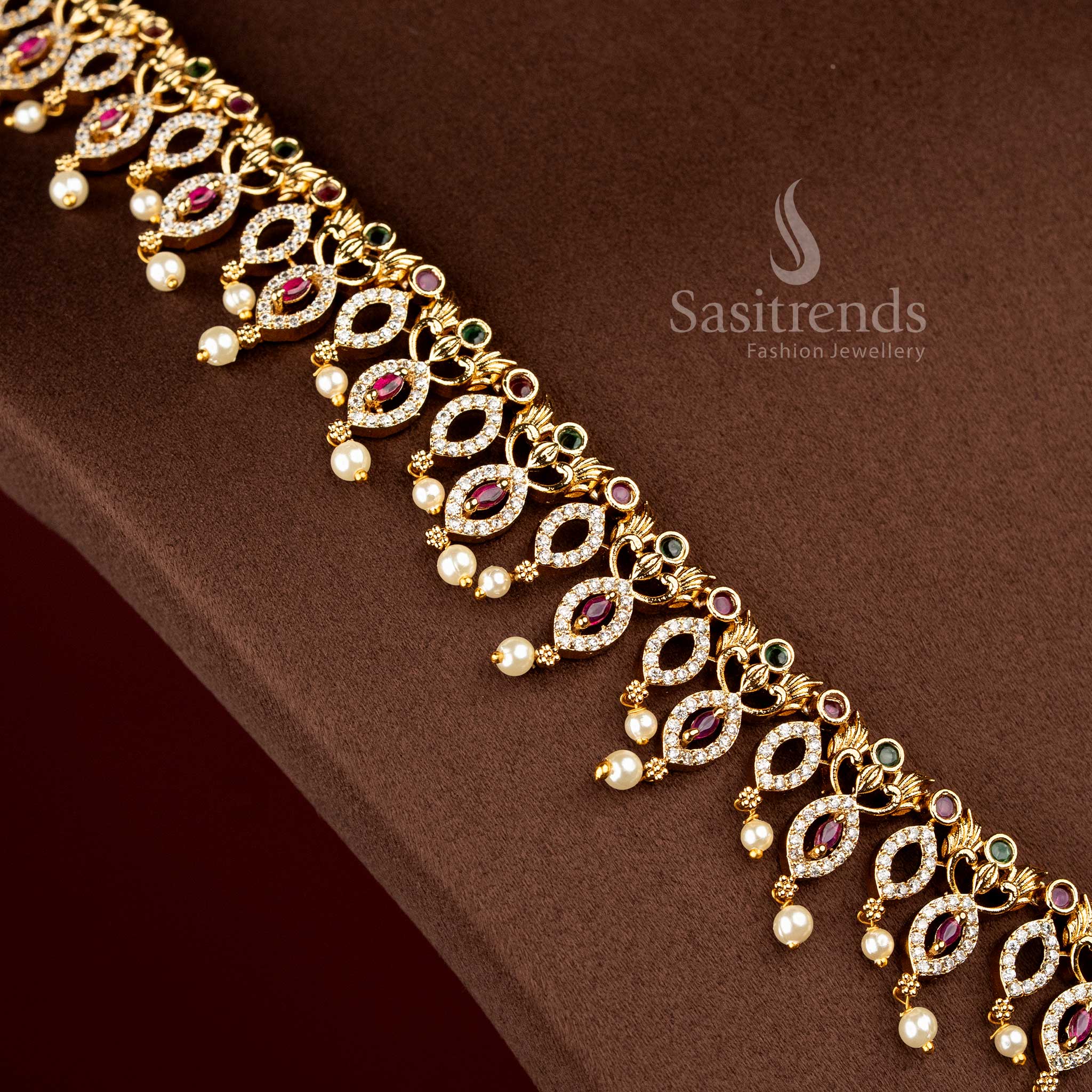 Sasitrends traditional temple matte gold plated paisley vine pearl drop multi AD stone long necklace jewellery set inspired by heritage temple artistry suitable for bridal wear, receptions, religious functions and family ceremonies