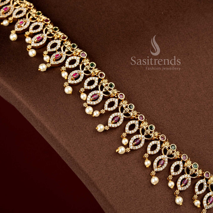 Sasitrends traditional temple matte gold plated paisley vine pearl drop multi AD stone long necklace jewellery set inspired by heritage temple artistry suitable for bridal wear, receptions, religious functions and family ceremonies