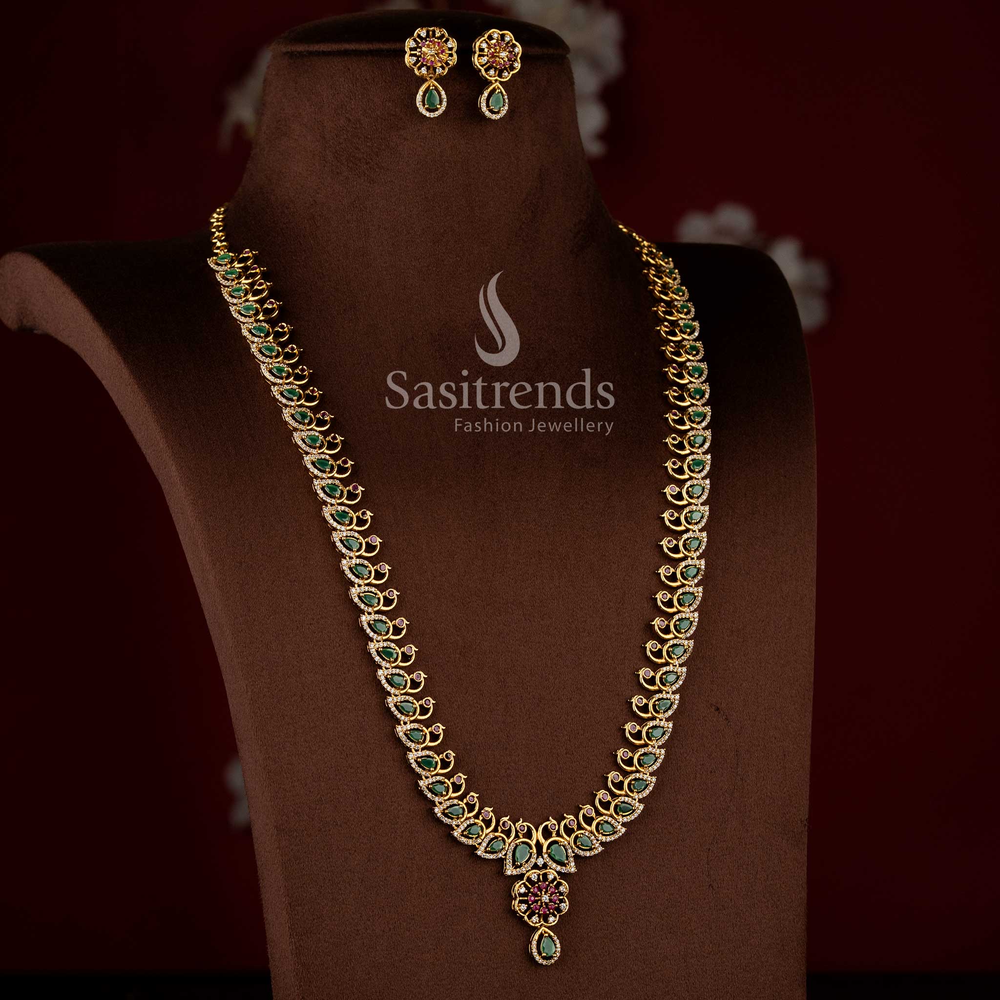Sasitrends traditional temple matte gold plated long jewellery necklace set featuring peacock design chain with floral drop pendant