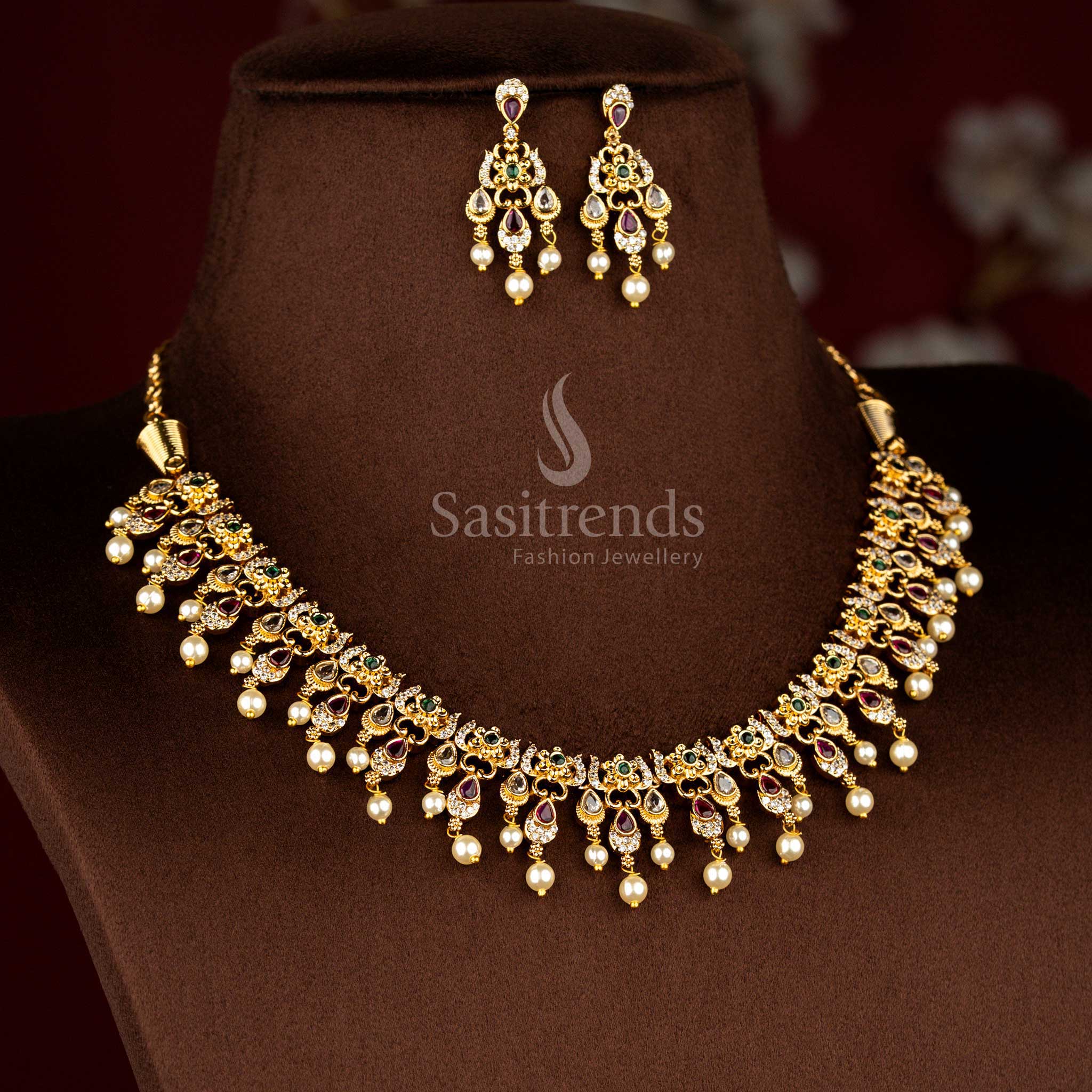 Sasitrends traditional temple matte gold plated teardrop motif floral multi AD stone short necklace jewellery set designed for bridal styling, festive celebrations, religious ceremonies and cultural functions