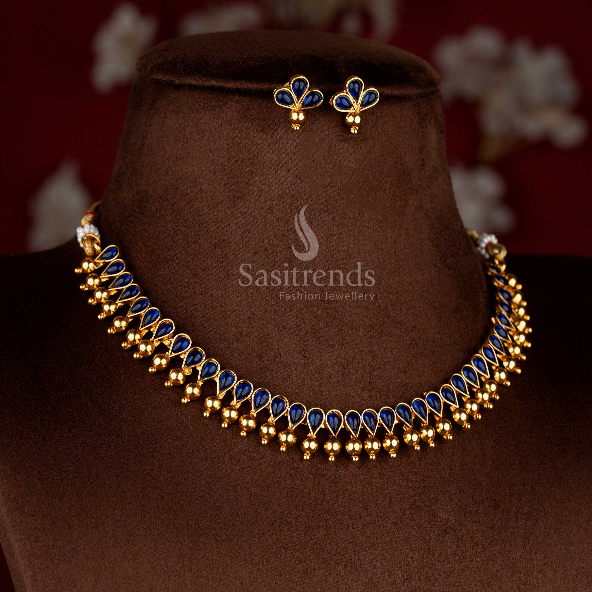 Sasitrends traditional temple style antique matte gold teardrop blue stone necklace suitable for saree wear and festive occasions