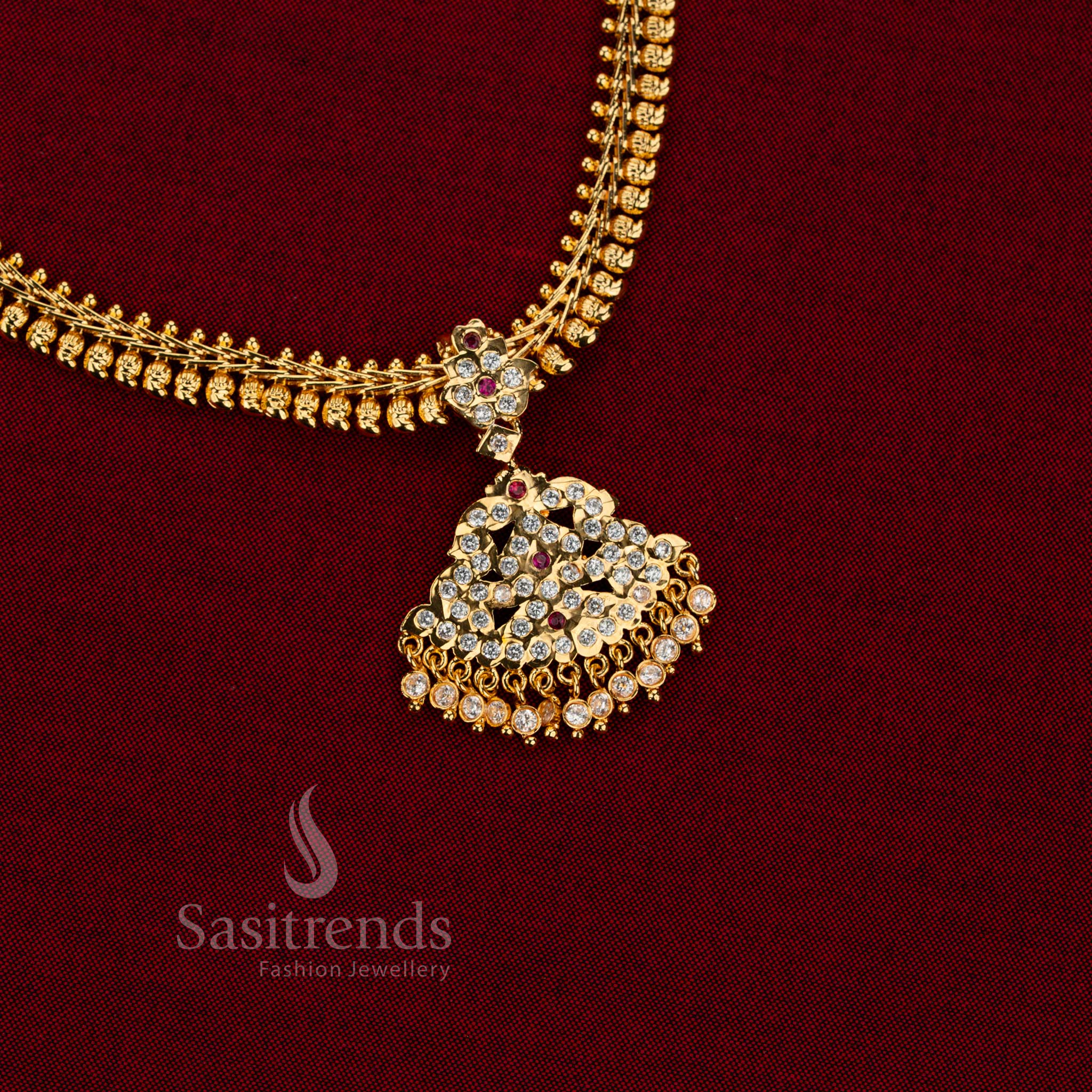 Real gold look Impon micro gold plated mango chain necklace white ruby AD stone from Sasitrends with structured bead links and floral inspired pendant
