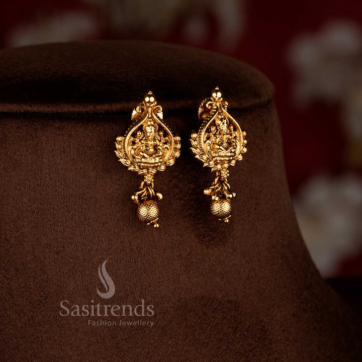 Graceful Premium Temple Matte Gold Plated Lakshmi Devi Motif Drop Earrings with Textured Bead Hangings | Rich Look Quality