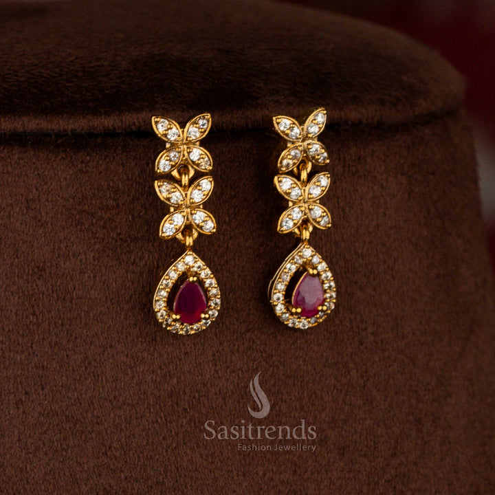 Sasitrends elegant party wear white ruby matte gold American diamond floral drop jewellery set for saree styling 