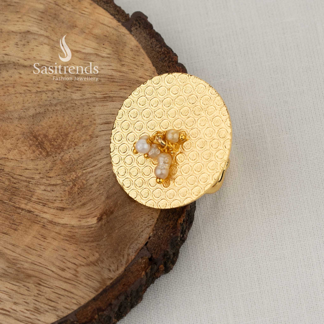 Modern trendy gold plated textured flat disc ring decorated with delicate white seed pearl accents and adjustable fitting ideal for everyday ethnic office and minimal fashion styling - Sasitrends