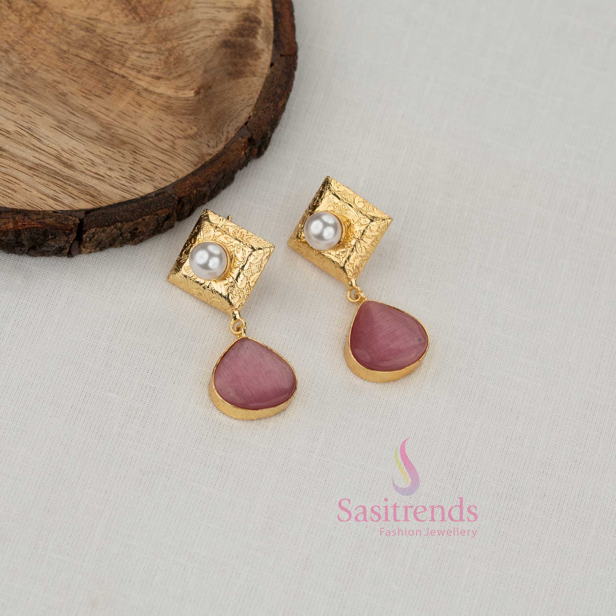 Sasitrends trendy gold plated pink statement earrings for girls featuring a textured square stud with pearl accent and sculpted framed drop design
