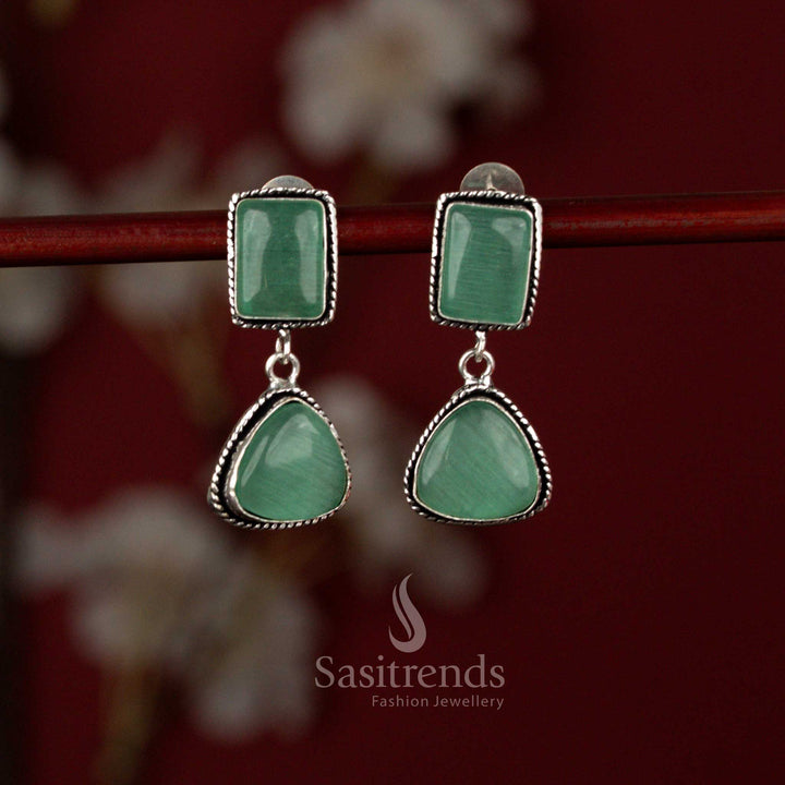 Sasitrends two-tier mint oxidised silver plated earrings featuring a luminous Monalisa stone centerpiece set within square and triangular geometric frames, enhanced with pearl drops for effortless casual styling.