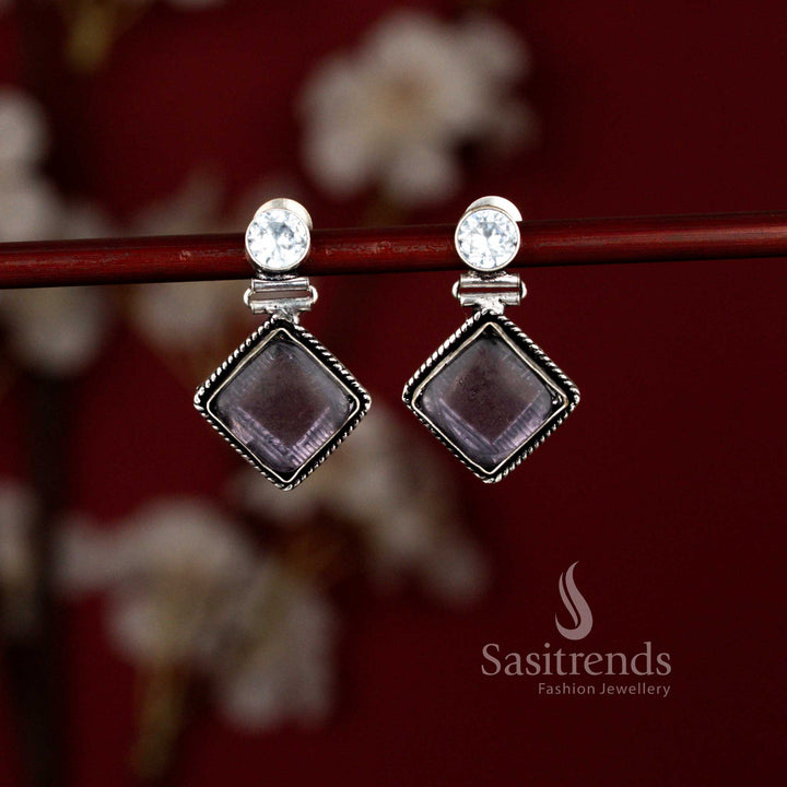 Sasitrends unique oxidised Monalisa purple stone drop earrings crafted in a sleek rhombus shape with an eye-inspired center detail, adding a refined touch to office attire and smart casual outfits.