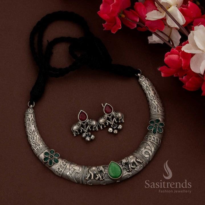 Sasitrends vintage inspired light green oxidised jewellery set showcasing elephant motif elements in structured husli necklace form