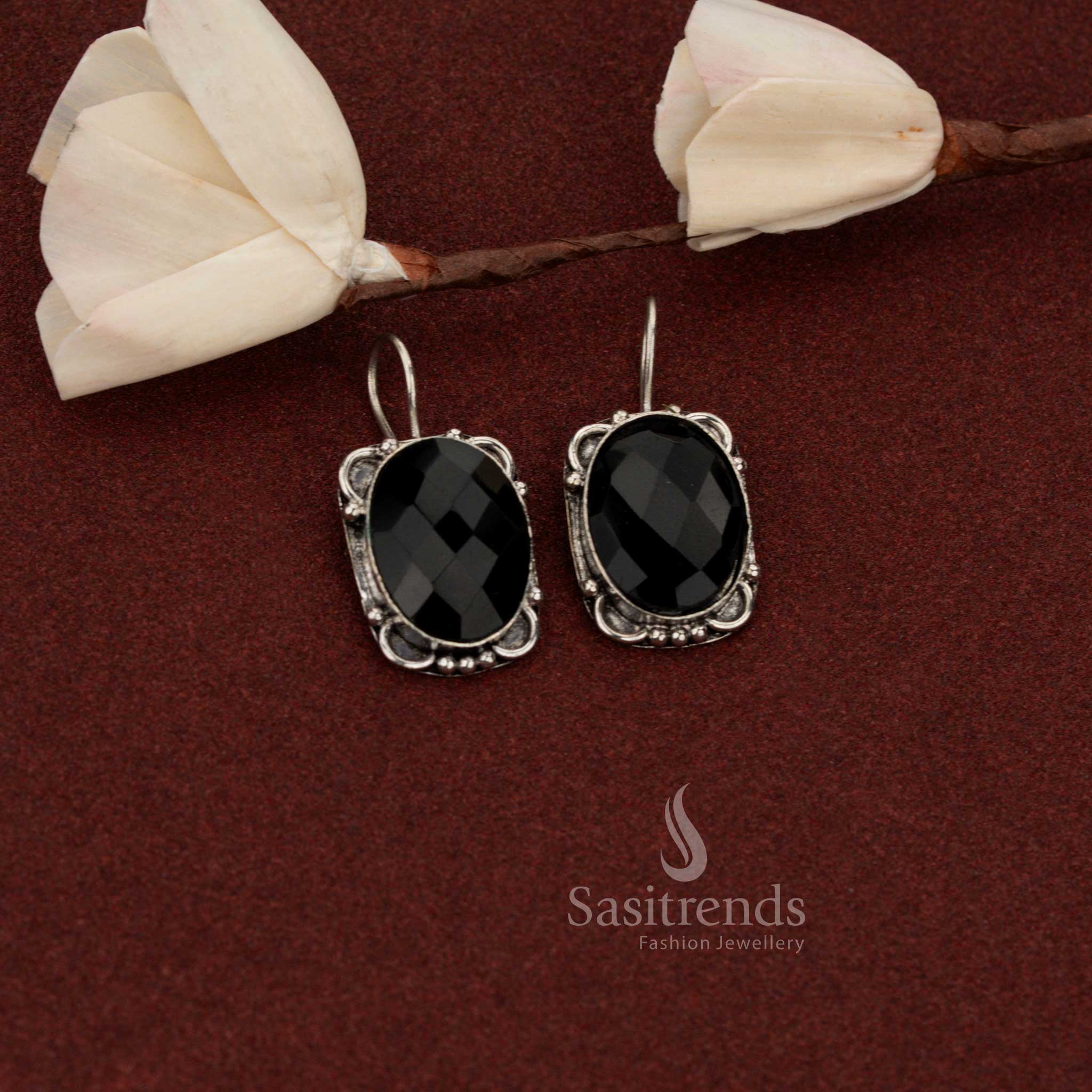 Sasitrends vintage inspired oxidised German silver drop earrings with oval black stone framed in floral motifs for ethnic styling