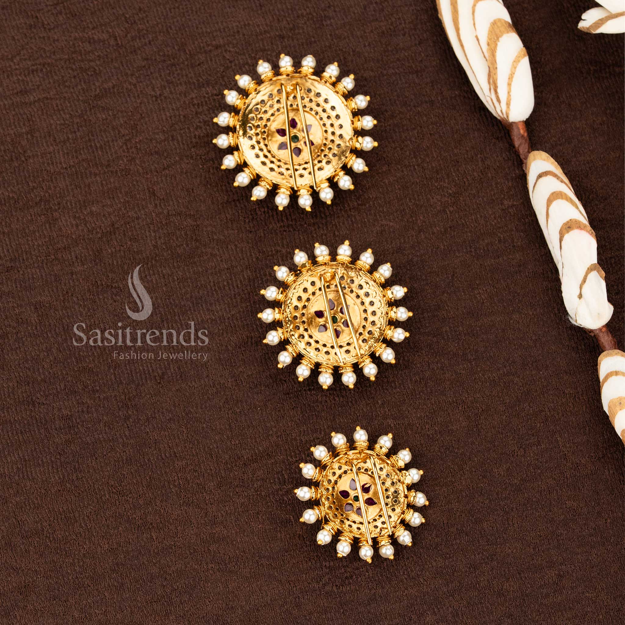 Sasitrends traditional matte gold plated jadai billai with structured circular frame and symmetrical floral medallion design