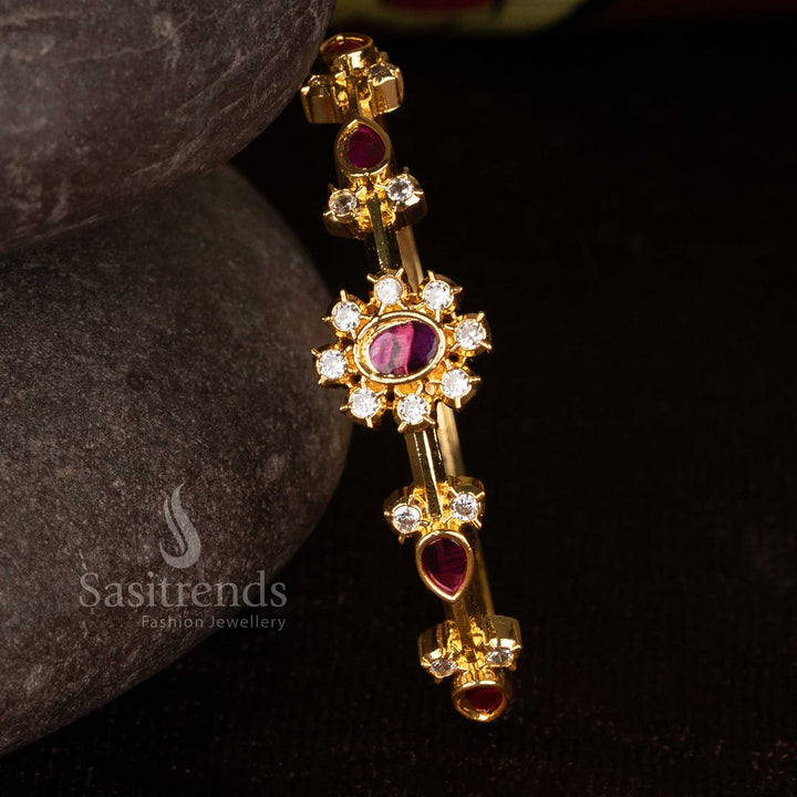 Sasitrends party wear white ruby american diamond micro gold plated bracelet featuring oval centre stone and teardrop stone accents