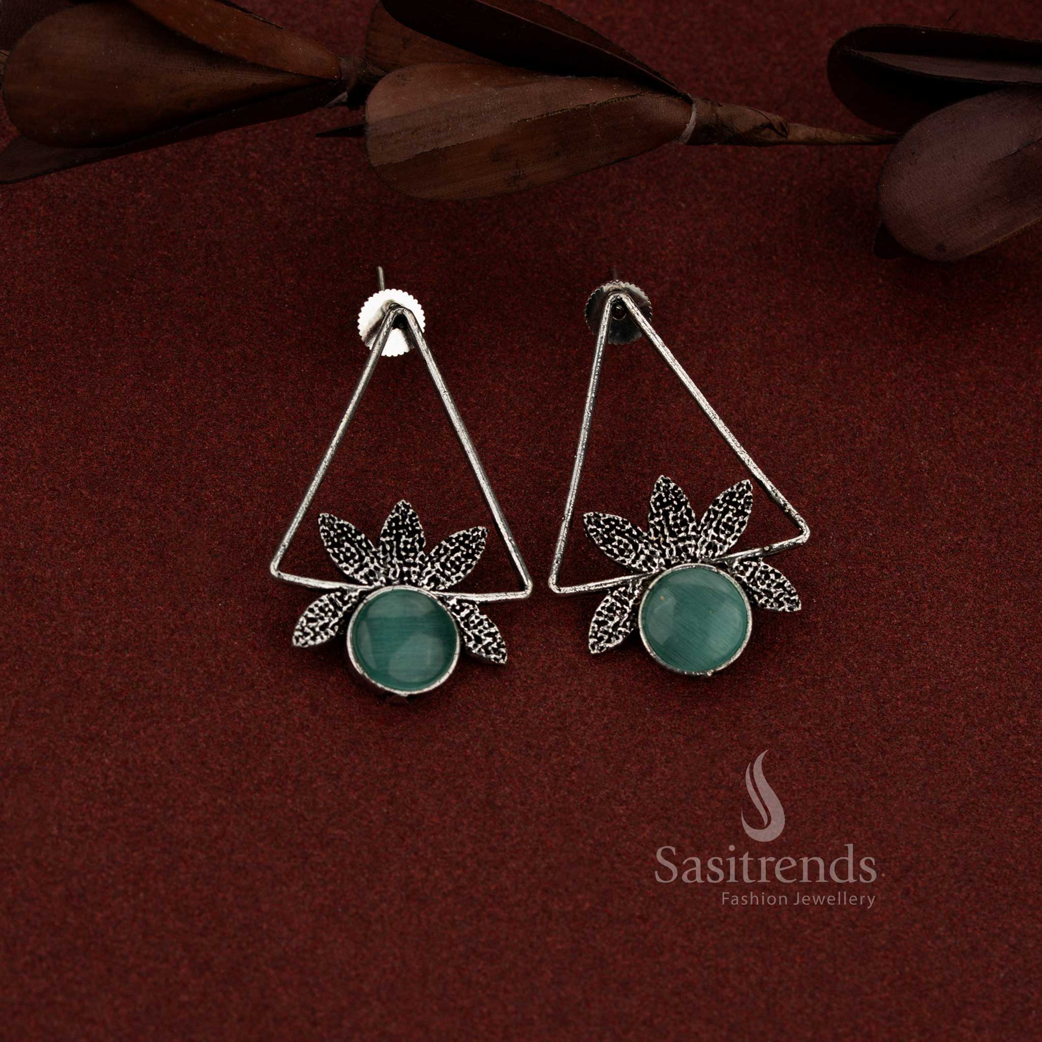 Statement oxidised triangle earrings with round mint stone embellishment for casual and evening styling