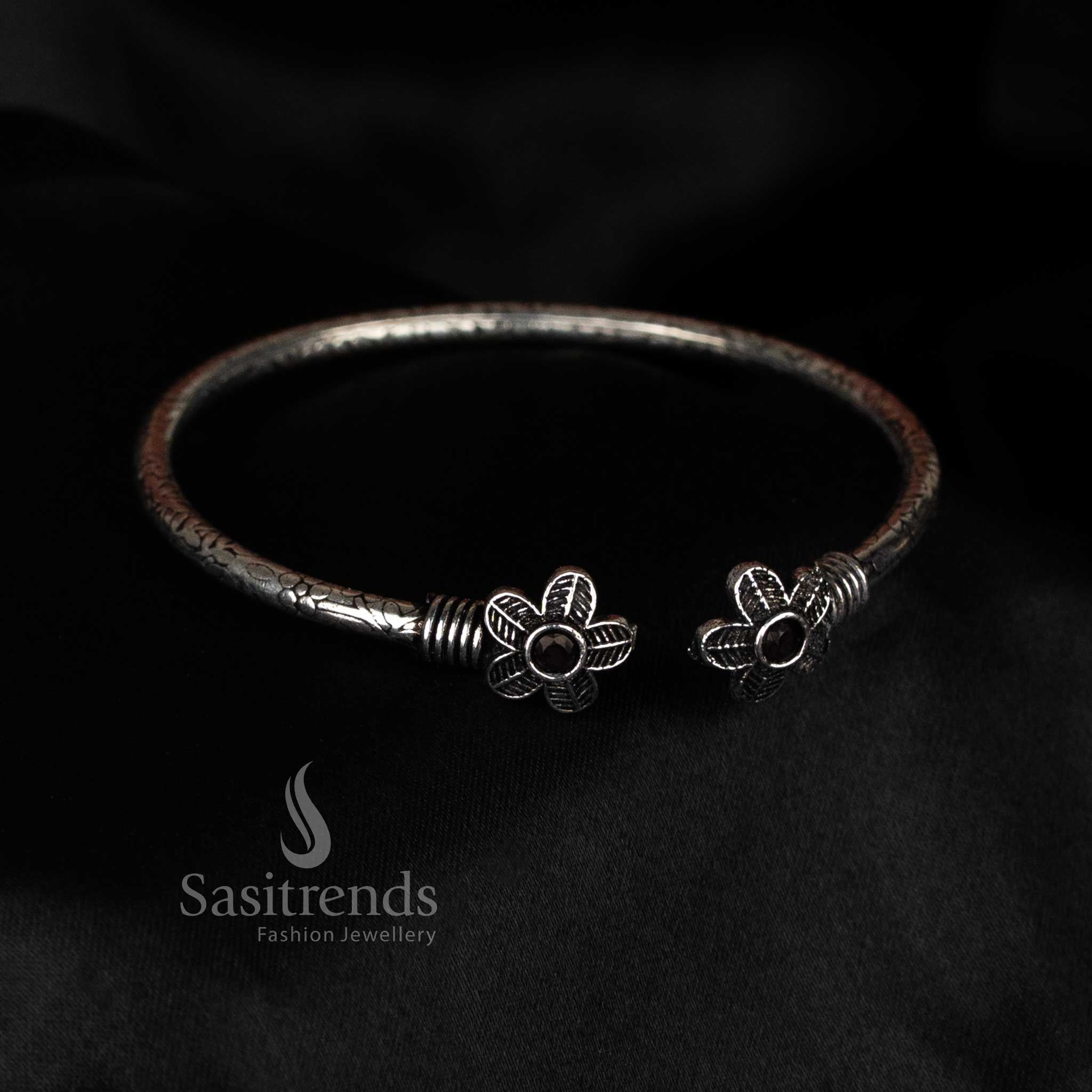 Sasitrends oxidised flower design bracelet with black stone detailing, perfect for traditional looks