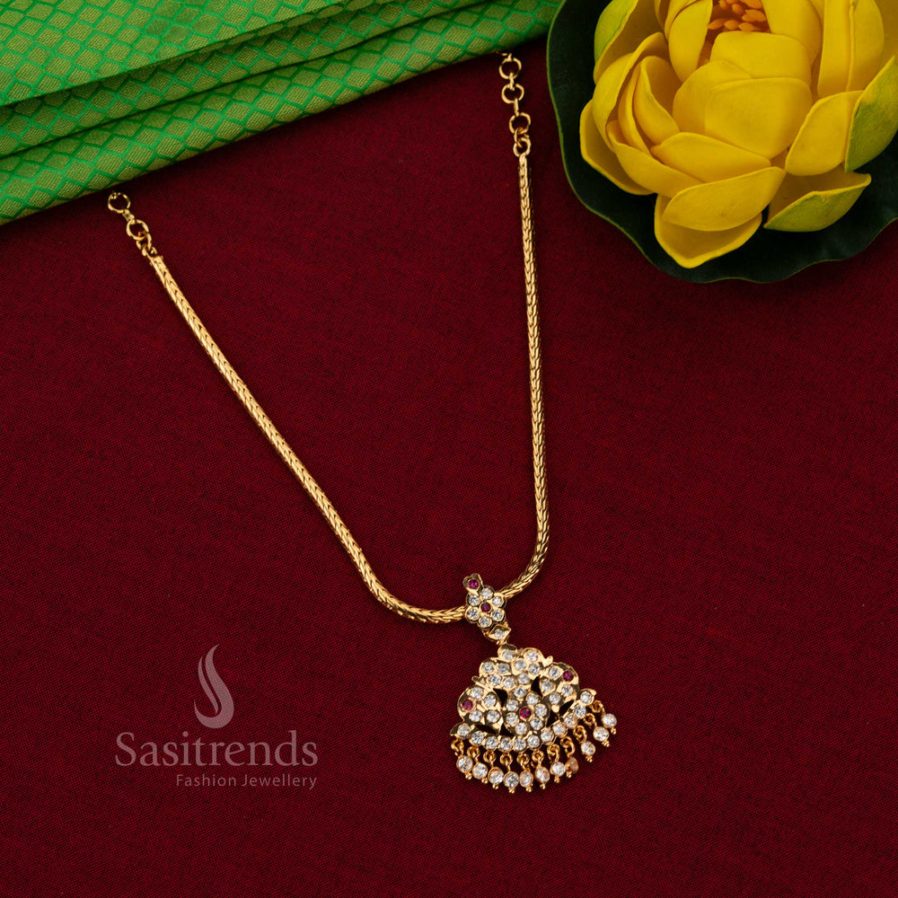 Classic Impon Attigai Micro gold plated white ruby AD stone necklace by Sasitrends featuring rounded layered pendant and hanging drop detailing
