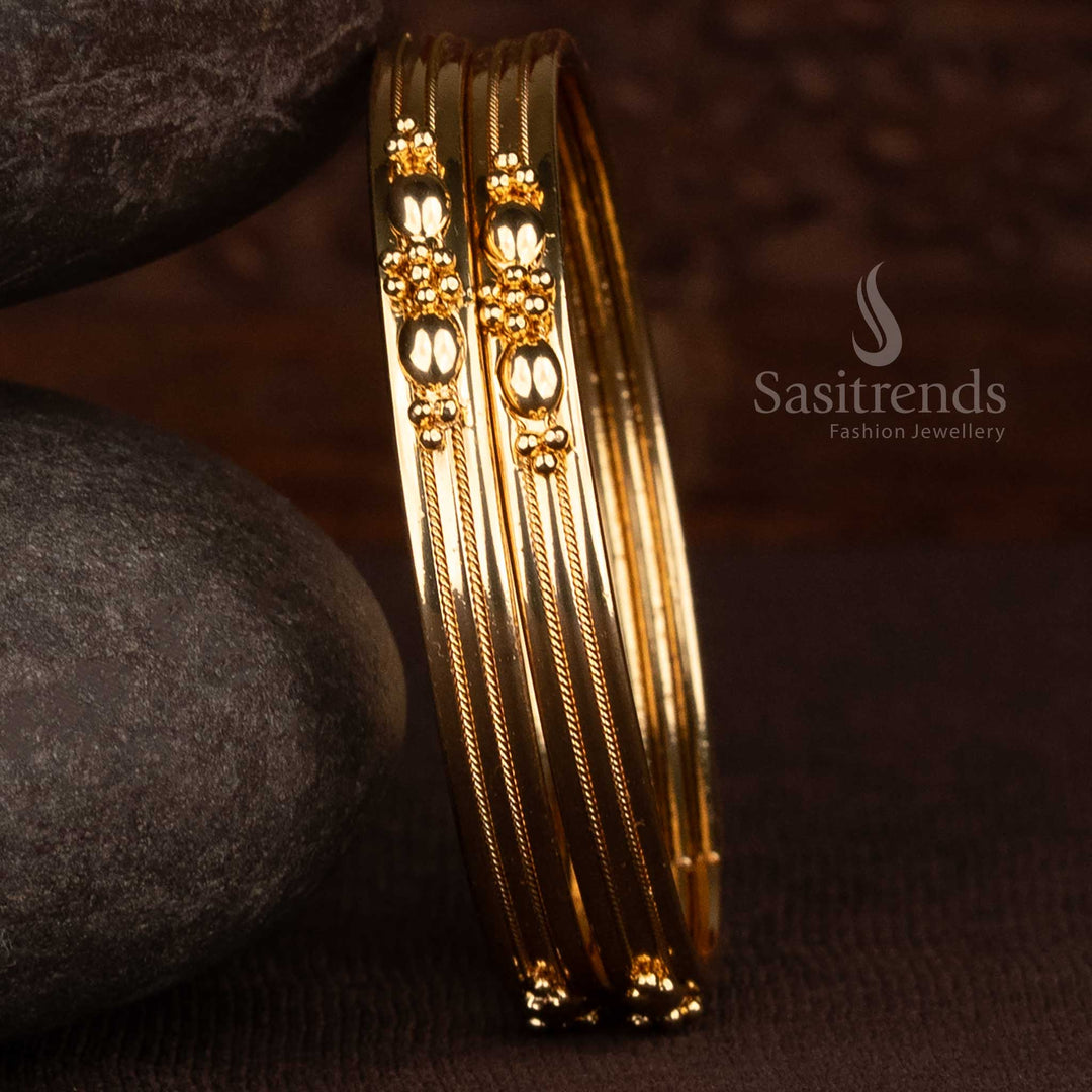 Elegant pair of 2 micro gold plated gundu mottu floral bangles for everyday ethnic wear - Sasitrends