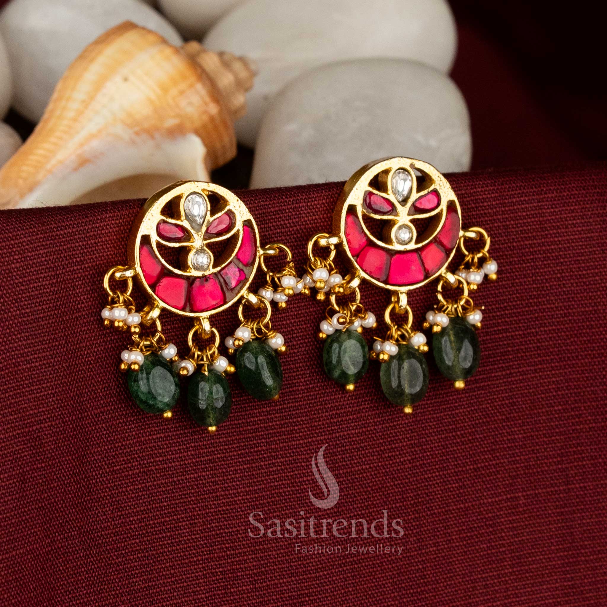 Traditional gold plated white ruby stone earrings adorned with pearls for ethnic occasions - Sasitrends