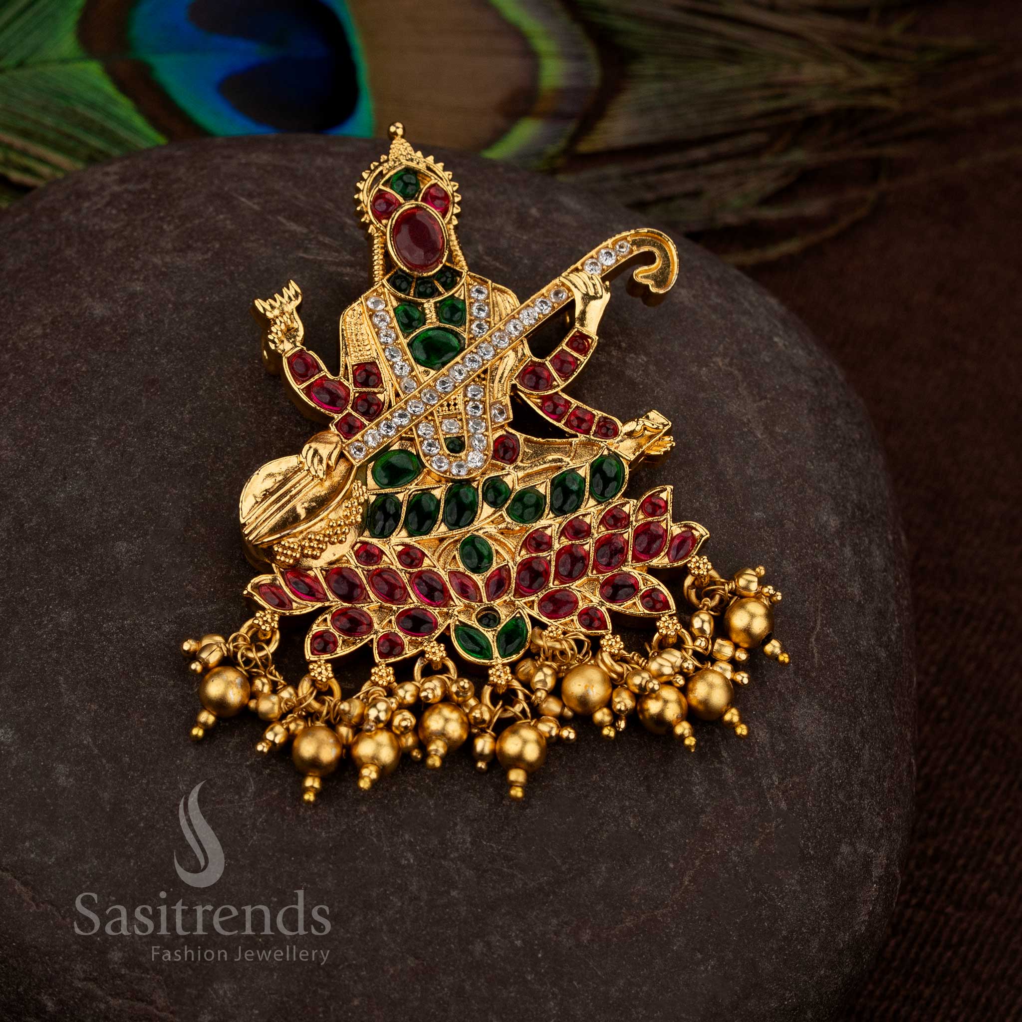 Traditional Saraswathi Devi motif temple pendant in matte gold finish featuring intricate stone work and hanging bead drops, high quality jewellery ideal for pooja, sasree and wedding wear - Sasitrends