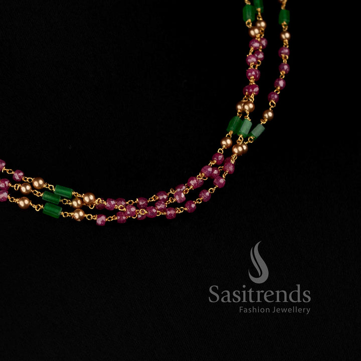 Sasitrends triple-strand necklace featuring Cubic Zirconia stones with green and pink bead detailing 