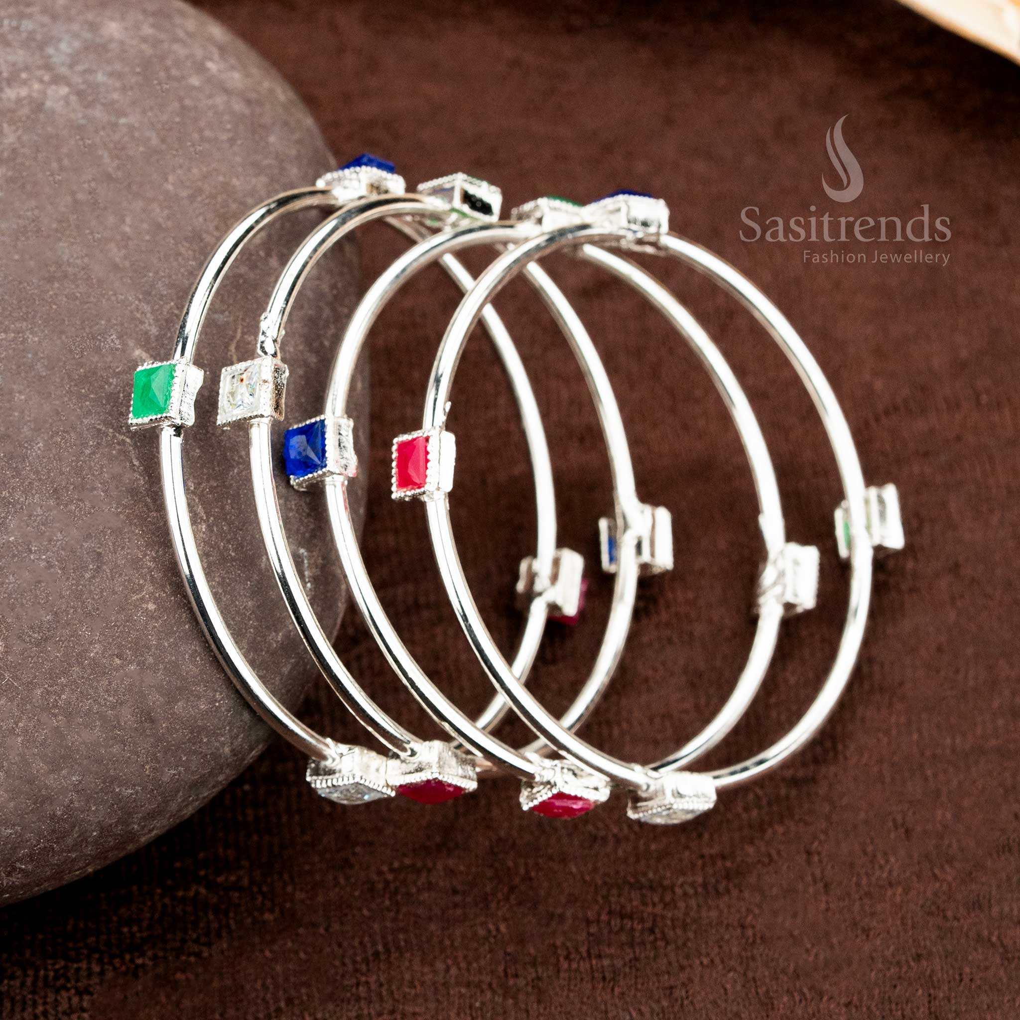 Artistic fusion silver multi German silver bangles stack with handcrafted colour details, funky street style elements, and a tribal jewellery aesthetic – sasitrends
