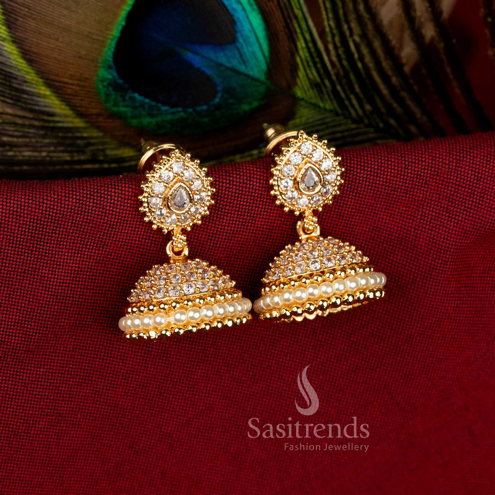 Festive white micro gold plated teardrop jhumka earrings with pearl dome and sparkling American diamonds for stylish celebrations – Sasitrends