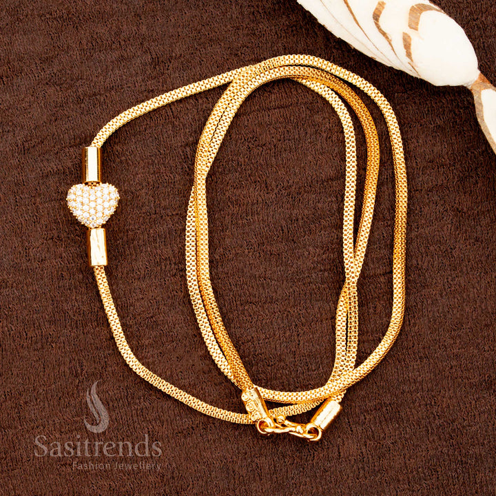Heart-style white Mugappu chain with glowing pink stone inlay and micro gold finish, the perfect traditional saree accessory – one gram jewellery by sasitrends