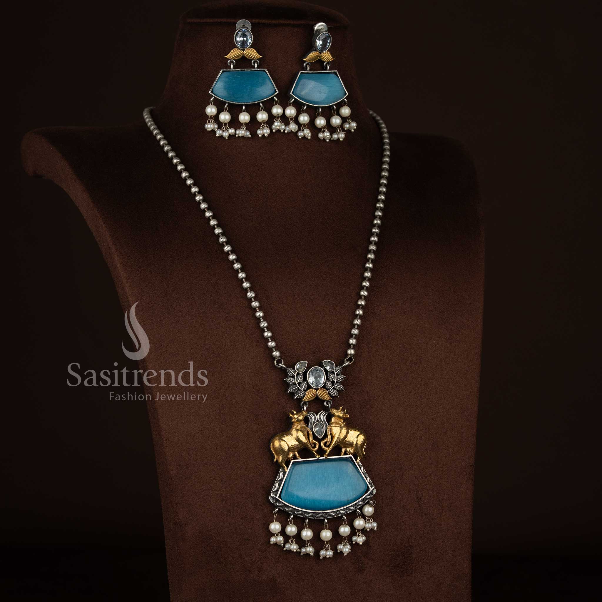 Stunning Antique Oxidised 92.5 Silver Plated Dual Tone Pichwai Kamadhenu Leaf Statement Necklace Set with Pearl Trapezoid Stones for traditional functions Sasitrends