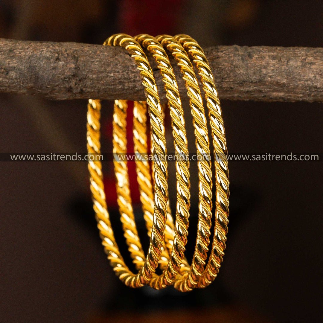 Set of four micro gold-plated kada bangles with an elegant spiral design