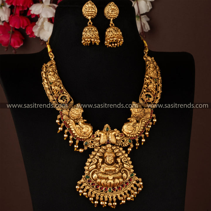Classic Matte Gold Divine Lakshmi and Peacock Pendant Necklace Jewellery Set with Jhumka