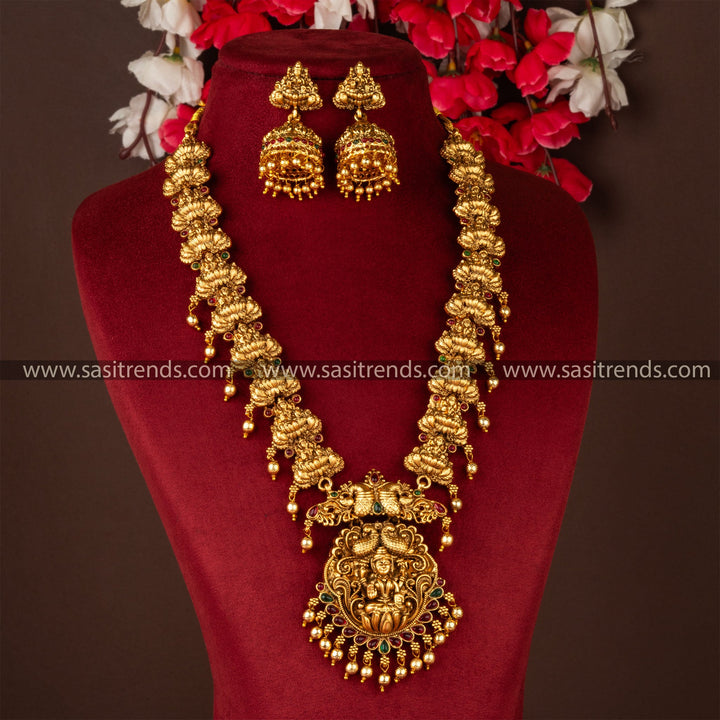 Divine: Classic Matte Gold Plated Lakshmi Pendant Long Necklace with Jhumka Jewellery Set