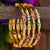 New Trendy White-Ruby Bangle Set | Micro Gold Plated | American Diamond Stones