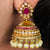 Ad Traditional Pearl Jhumka Earrings - Traditional Indian jewelry with pearl embellishments for a touch of elegance and sophistication.