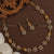 Traditional Lakshmi and Stone Flower Motif Necklace Set - Symbolic Elegance for Formal Events