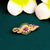Elegant mango leaf pattern AD stone micro gold plated saree pin for traditional attire.