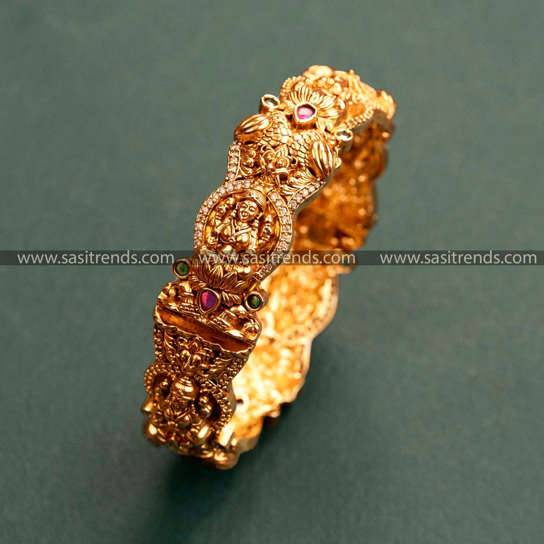 Temple Gold Finish Lakshmi & Peacock Motifs Kada Bangle with Ruby-Green Stones