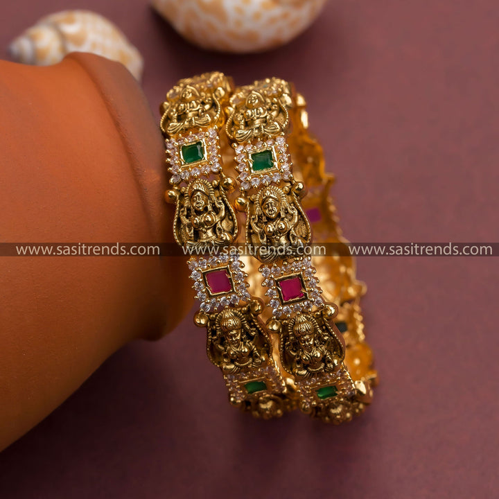 Matte gold plated Lakshmi bangles with multi-color stones - Traditional elegance